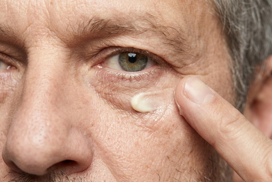 Applying the cream under the eye