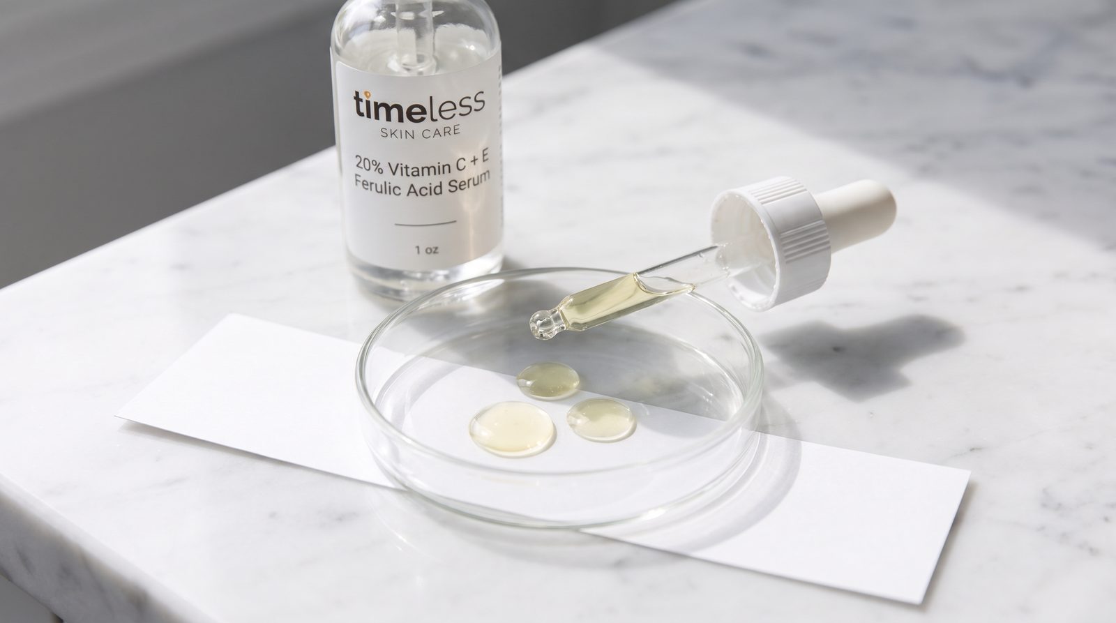 Timeless 20% Vitamin C + E Ferulic Acid Serum with drops in a petri dish